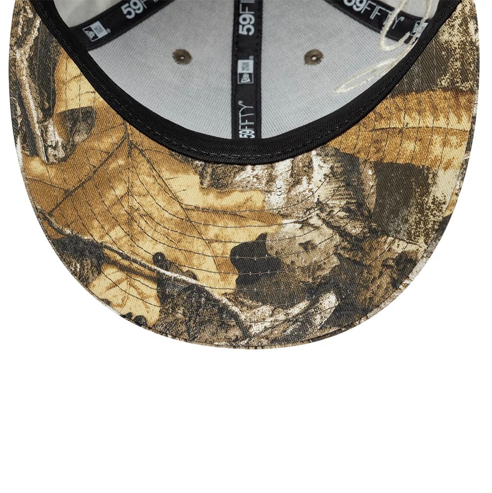 Pictured is this New Era Side Script Low Profile 59FIFTY Fitted cap in Realtree camo. 7