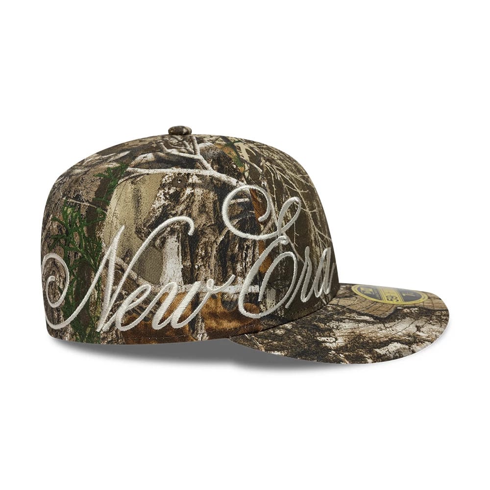 Pictured is this New Era Side Script Low Profile 59FIFTY Fitted cap in Realtree camo. 5