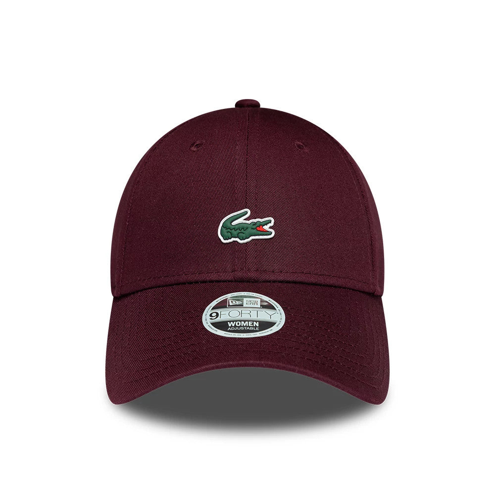 Pictured is this Womens Lacoste X New Era 9FORTY cap in dark purple. 2