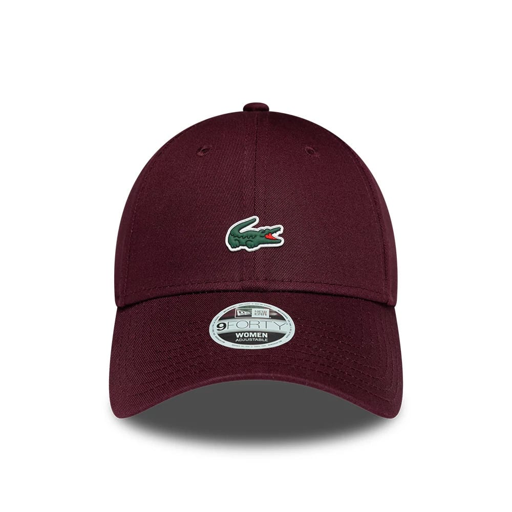 Pictured is this Womens Lacoste X New Era 9FORTY cap in dark purple. 2