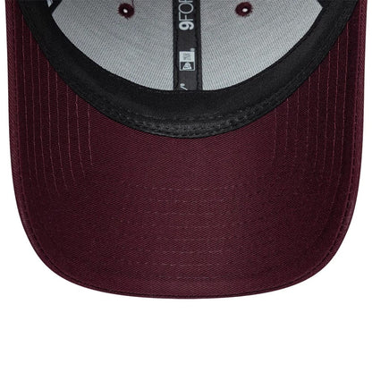 Pictured is this Womens Lacoste X New Era 9FORTY cap in dark purple. 7