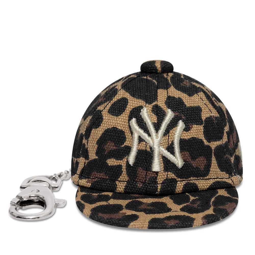 Pictured is this MLB Leo Mini Cap New York Yankees Key Chain in black. 2