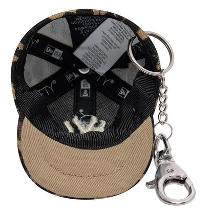 Pictured is this MLB Leo Mini Cap New York Yankees Key Chain in black. 5