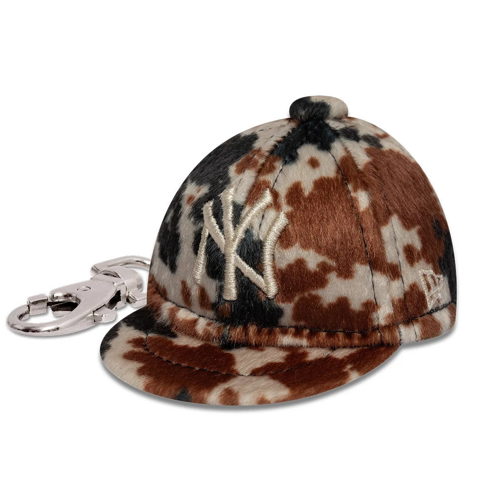 Pictured is this MLB Animal Mini Cap New York Yankees Key Chain in brown. 1