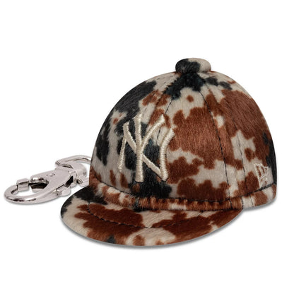 Pictured is this MLB Animal Mini Cap New York Yankees Key Chain in brown. 1