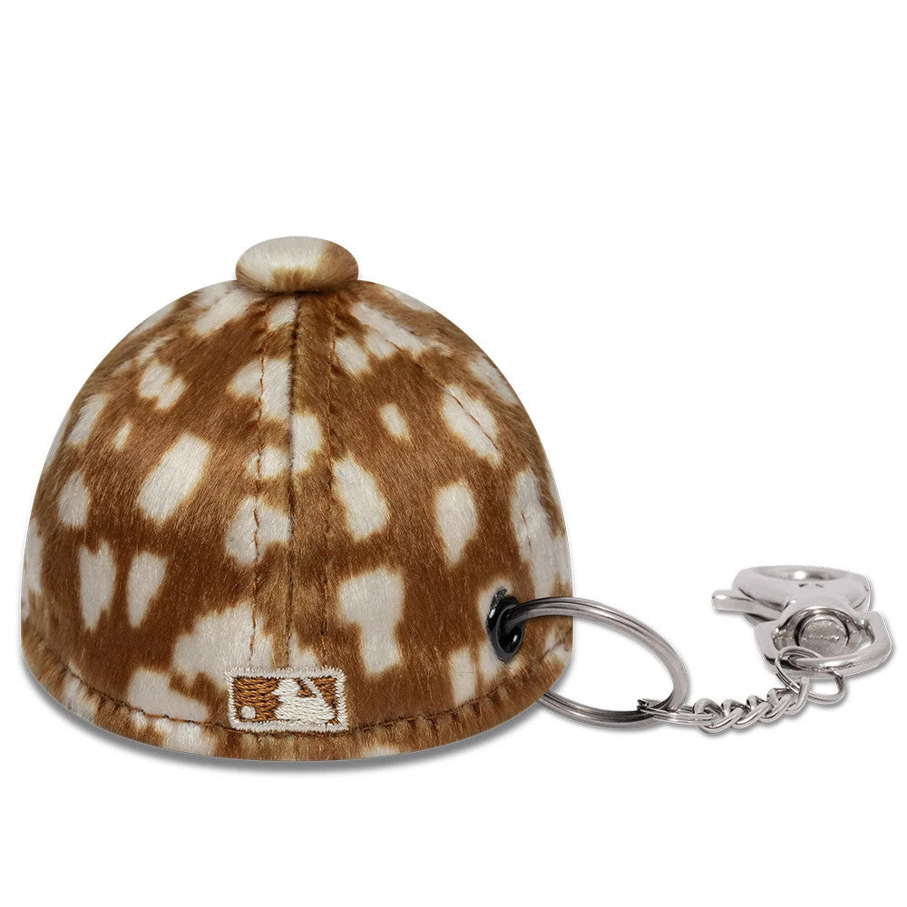 Pictured is this MLB Animal Mini Cap New York Yankees Key Chain in light brown. 4
