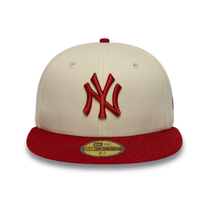 Pictured is this MLB League Essential New York Yankees 59FIFTY Fitted cap in cream & red. 2