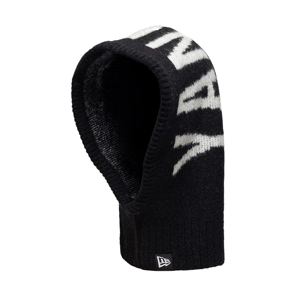 New Era New York Yankees MLB Script Black Balaclava Hat, side view showing large white Yankees script lettering along the top, a snug hooded design in black knit fabric, and the New Era flag logo on the lower edge.