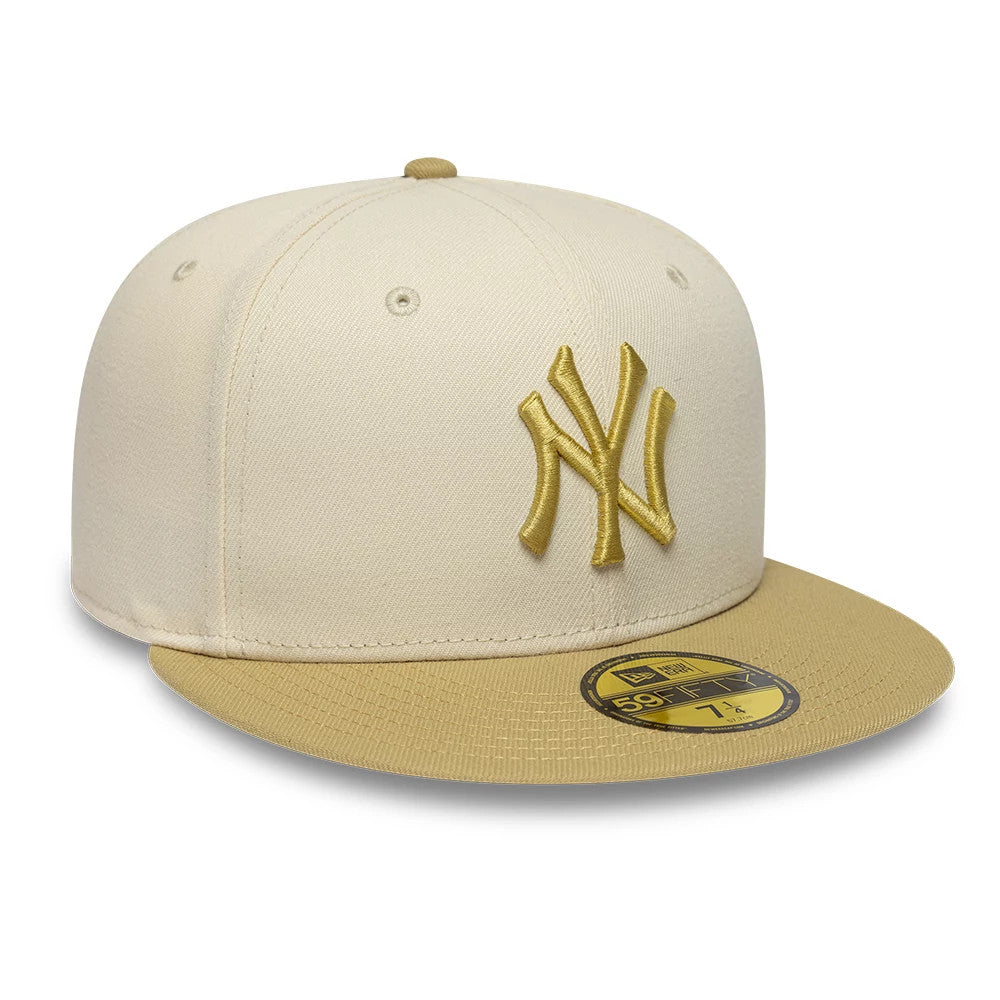 Pictured is this MLB League Essential New York Yankees 59FIFTY Fitted cap in cream & gold. 3