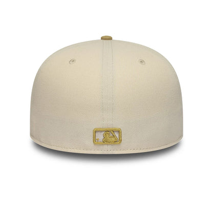 Pictured is this MLB League Essential New York Yankees 59FIFTY Fitted cap in cream & gold. 4