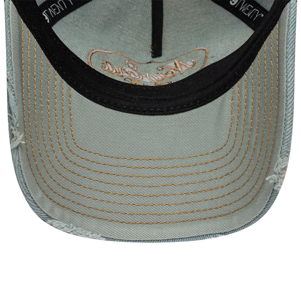 Pictured is this Womens New Era Distress 9TWENTY A-Frame cap in pastel blue. 5
