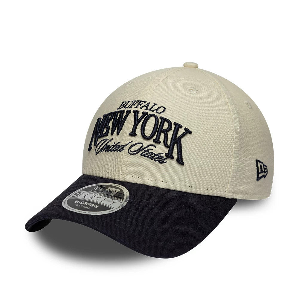 Pictured is this New Era New York 9FORTY M-Crown cap in light beige & black. 1