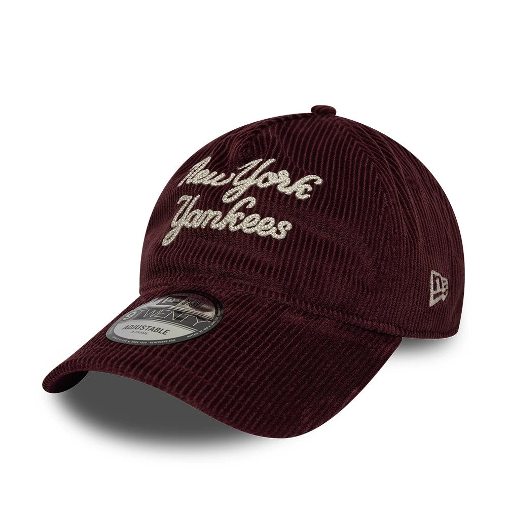 New York Yankees MLB Cord Script Burgundy New Era 9TWENTY A-Frame Adjustable Cap, front view showing the cream embroidered New York Yankees script on the structured burgundy corduroy crown, with the 9TWENTY size sticker on the curved visor.