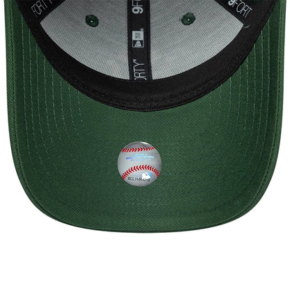 New York Yankees Youth MLB Metallic Dark Green New Era 9FORTY Adjustable Cap, inside view showing the black taping with logos, the grey sweatband, and the underside of the dark green visor with a baseball graphic sticker.