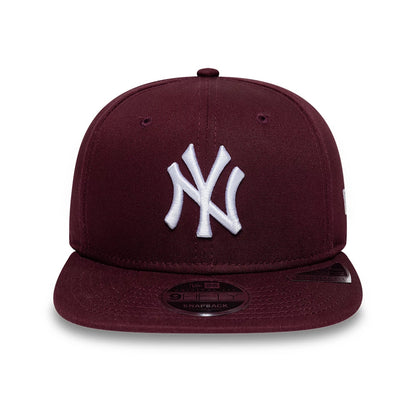 Pictured is this MLB League Essential New York Yankees 9FIFTY Original Fit cap in dark purple. 2