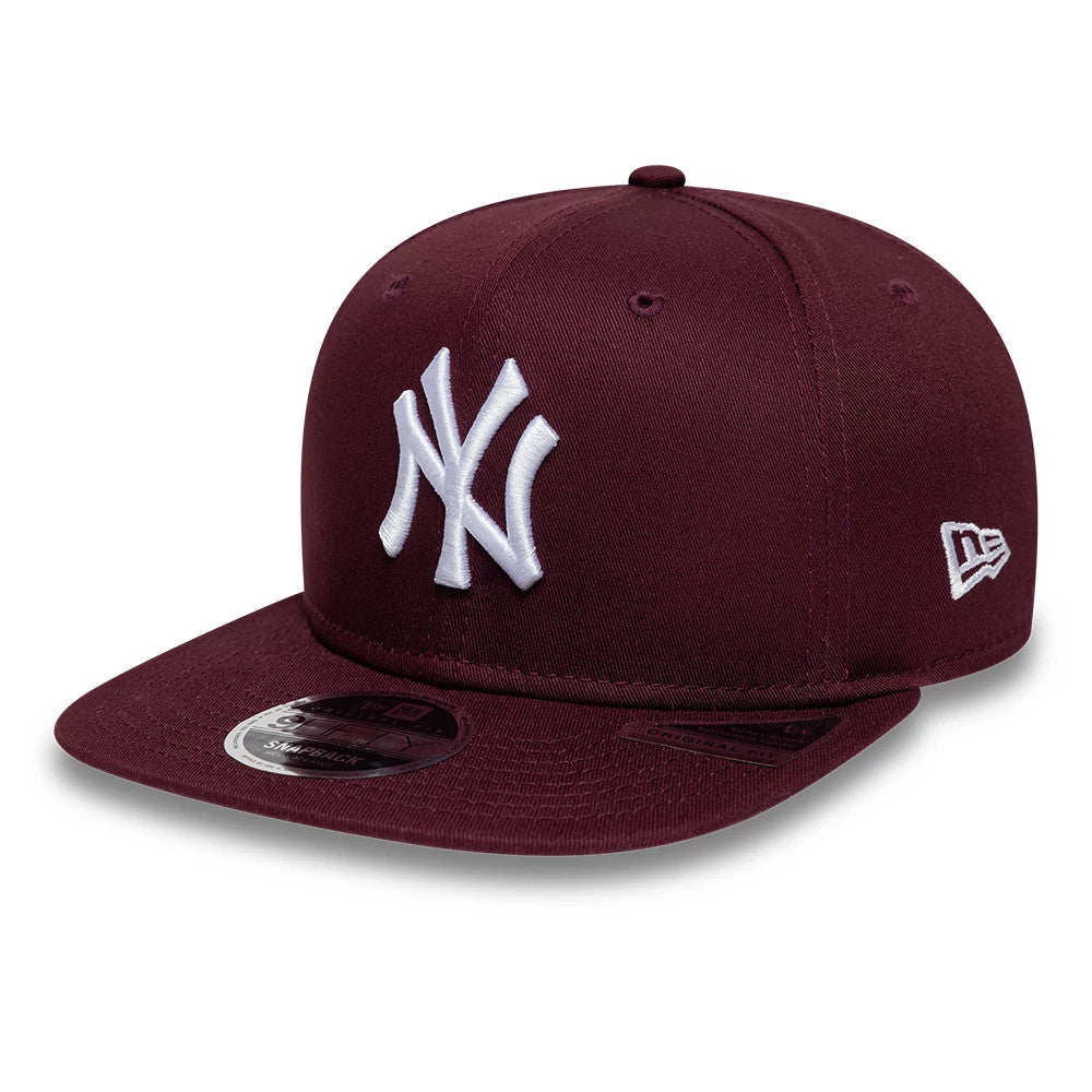 Pictured is this MLB League Essential New York Yankees 9FIFTY Original Fit cap in dark purple. 1