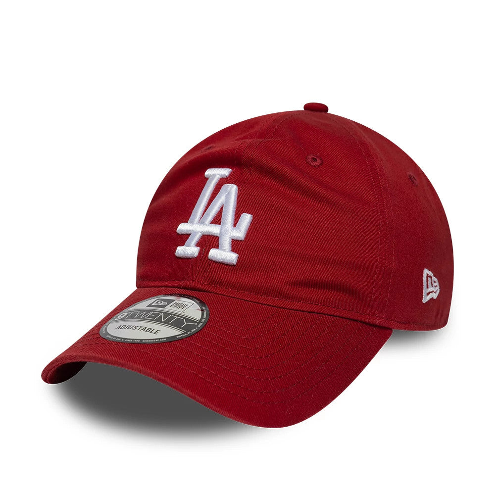 LA Dodgers MLB League Essential Dark Red New Era 9TWENTY Adjustable Cap, three-quarter view showing raised white LA logo embroidered on the front panel, with a curved red visor and a 9TWENTY size sticker on the visor.