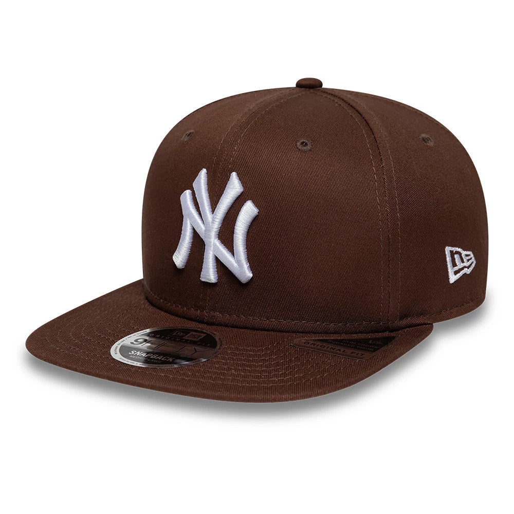 Pictured is this MLB League Essential New York Yankees 9FIFTY Original Fit cap in brown. 1