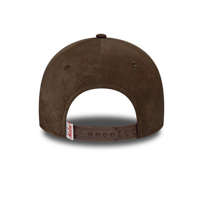 Pictured is this New Era Moto Patch PU 9FORTY E-Frame cap in brown. 4