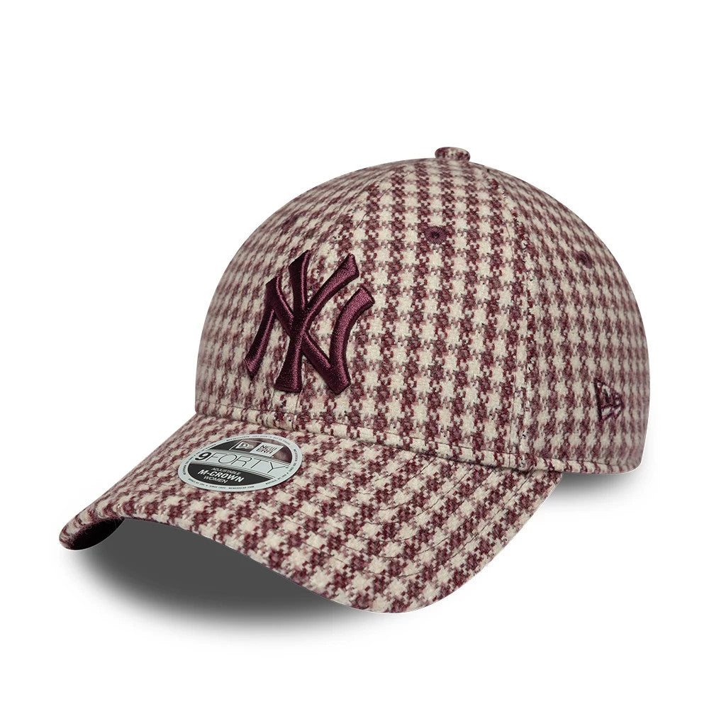 Pictured is this Womens MLB Houndstooth New York Yankees 9FORTY M-Crown cap in dark red. 1