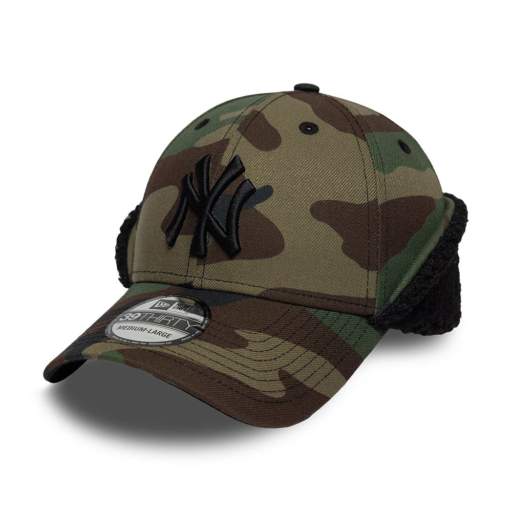 New York Yankees MLB Camo Black New Era 39THIRTY Downflap Stretch Fit Cap, three-quarter view showing the raised black embroidered NY logo on the front panel, camo pattern across the crown, and 39THIRTY size sticker on the curved visor.