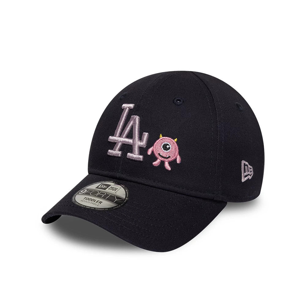 LA Dodgers Toddler MLB Monster Icon Navy New Era 9FORTY Adjustable Cap, front view showing silver LA embroidery with a pink monster icon on the front panel, a curved navy visor, and a 9FORTY size sticker.