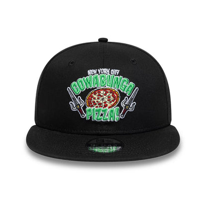 Youth Teenage Mutant Ninja Turtles Black New Era 9FIFTY Snapback Adjustable Cap, front view showing the embroidered Cowabunga Pizza graphic with crossed sai weapons and pizza slice on the structured black crown.