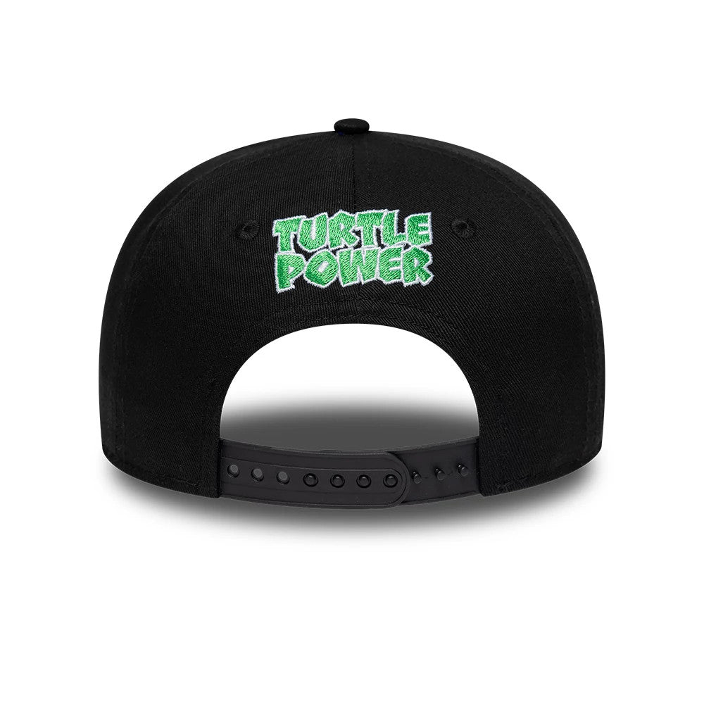 Youth Teenage Mutant Ninja Turtles Black New Era 9FIFTY Snapback Adjustable Cap, rear view showing the green embroidered Turtle Power text on the black structured crown, with an adjustable black snapback closure beneath.