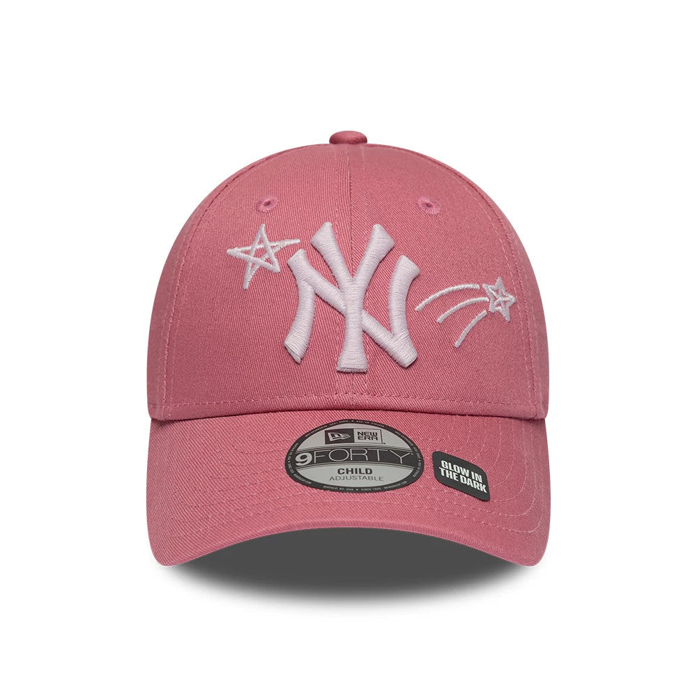 Yankees Child MLB Space Glow In The Dark Pink New Era 9FORTY Adjustable Cap, front view showing the white embroidered NY logo flanked by star and comet designs on the pink structured crown, with a 9FORTY size sticker on the visor.