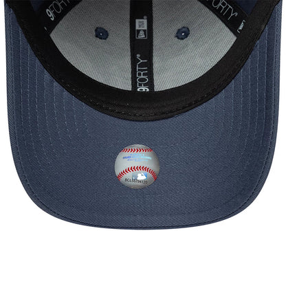 Yankees Child MLB Space Glow In The Dark Blue New Era 9FORTY Adjustable Cap, inside view showing the black sweatband with 9FORTY branding, grey taping along the crown seams, navy undervisor, and a printed sticker featuring a baseball design.