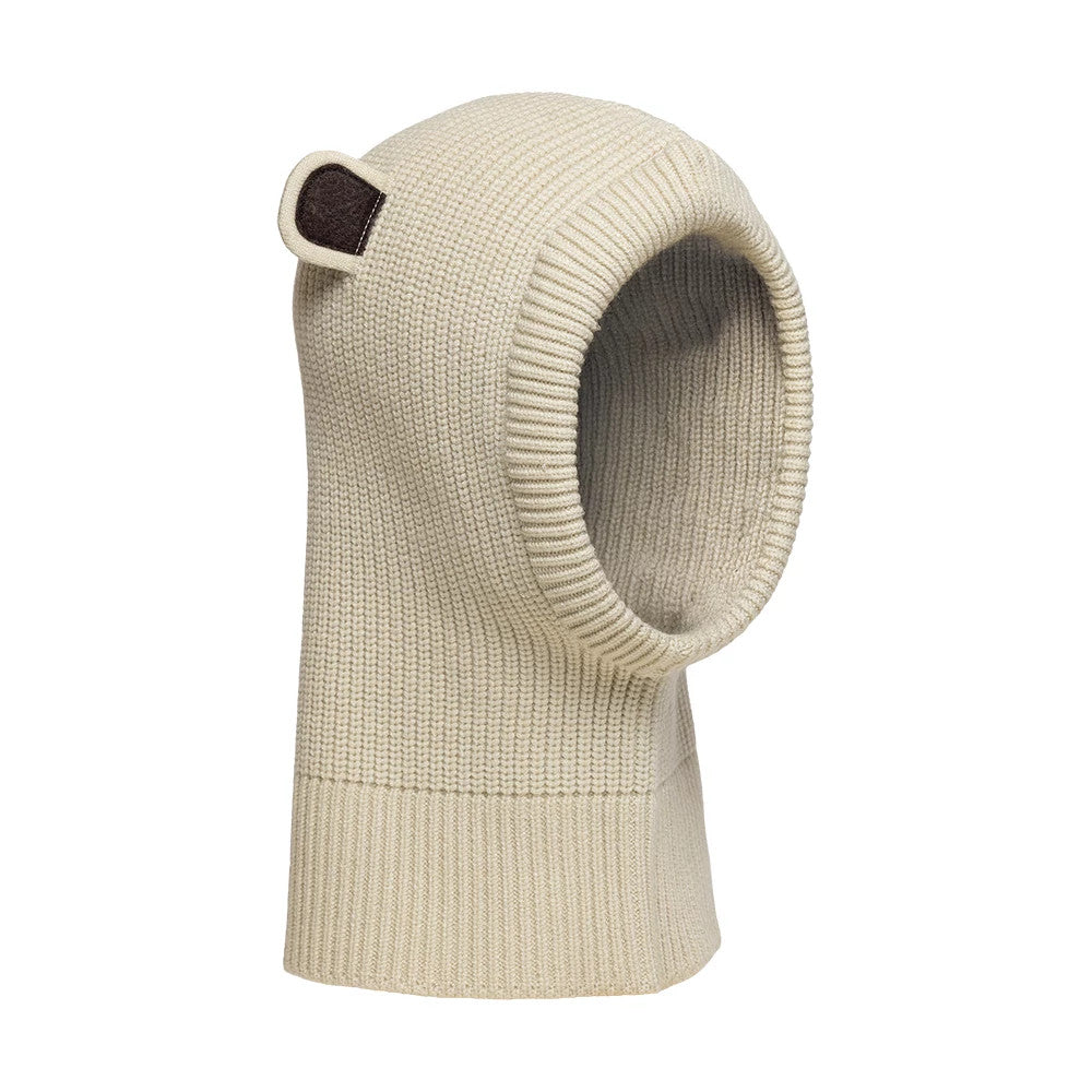 Child New Era Bear Light Beige Balaclava Hat, side view showing the knitted light beige fabric with two small bear ears on top, a ribbed texture around the opening, and a seamless design extending down the neck.