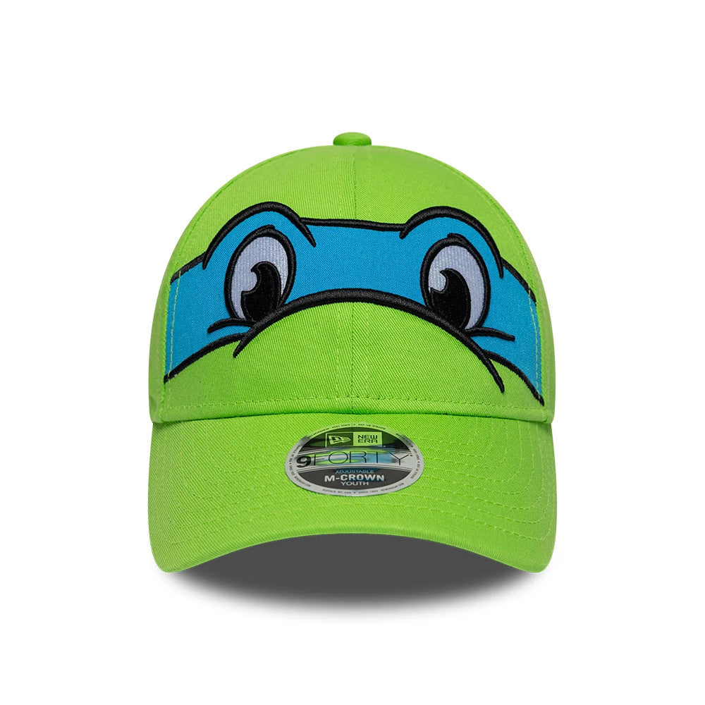 Youth TMNT Face Bright Green New Era 9FORTY M-Crown Adjustable Cap, front view showing the blue TMNT mask graphic with black embroidered outlines on the crown, curved bright green visor, and a 9FORTY size sticker.