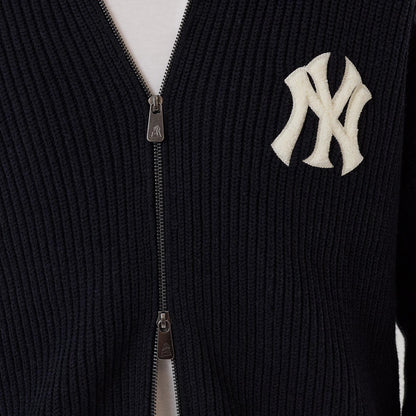 The model is wearing this MLB New York Yankees 2 Way Zip Cardigan in navy. 3