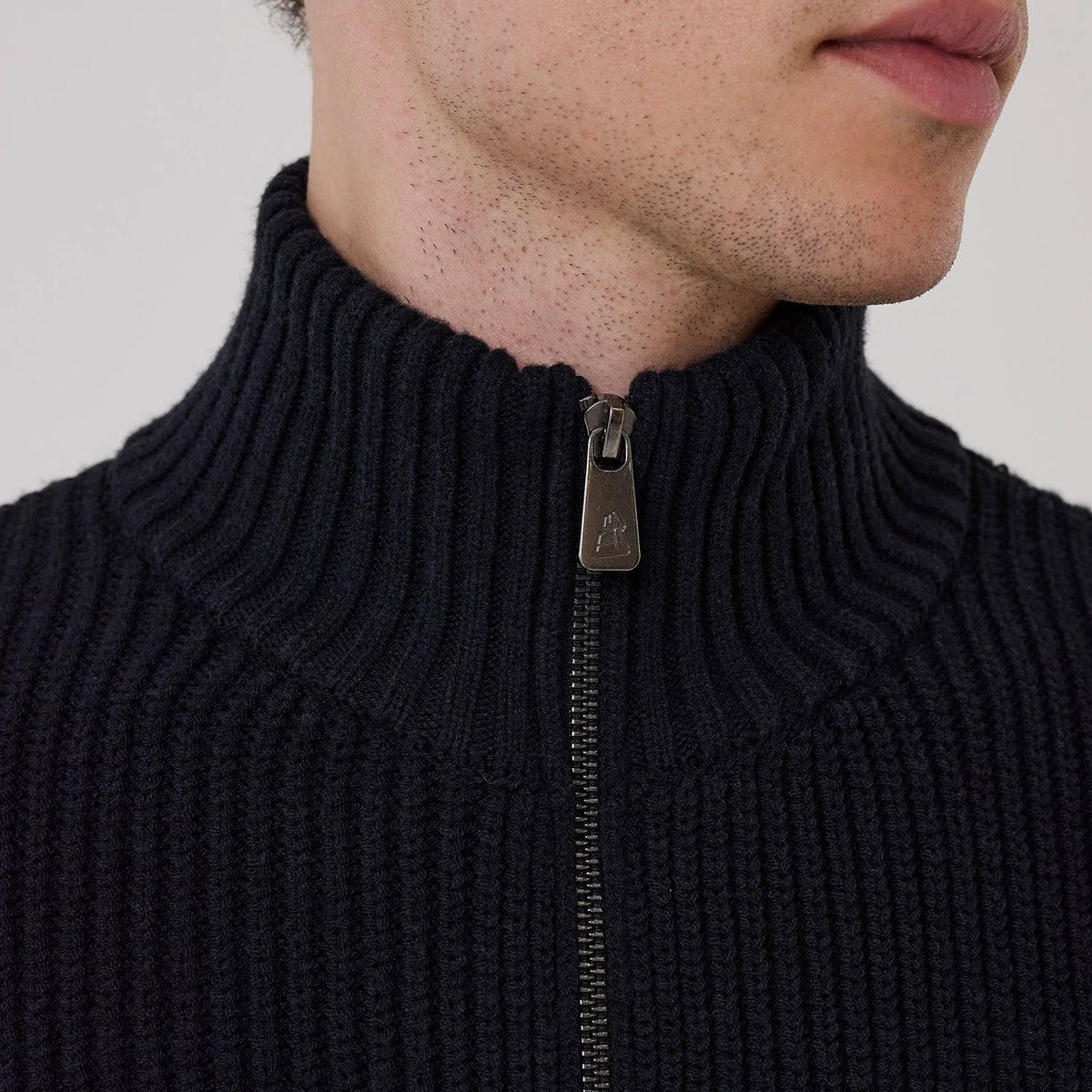 The model is wearing this MLB New York Yankees 2 Way Zip Cardigan in navy. 5