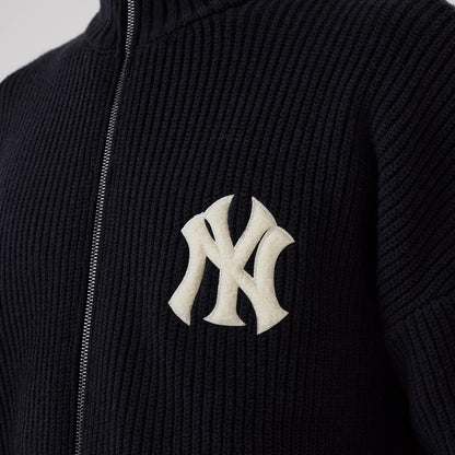 The model is wearing this MLB New York Yankees 2 Way Zip Cardigan in navy. 4