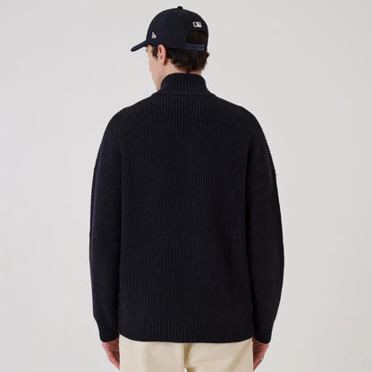 The model is wearing this MLB New York Yankees 2 Way Zip Cardigan in navy. 2