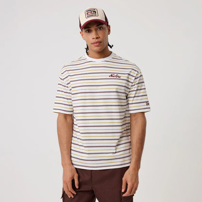 The model is wearing this New Era Stripe T-Shirt in white. 3