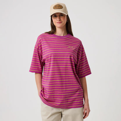 The model is wearing this New Era Stripe T-Shirt in bright purple. 4