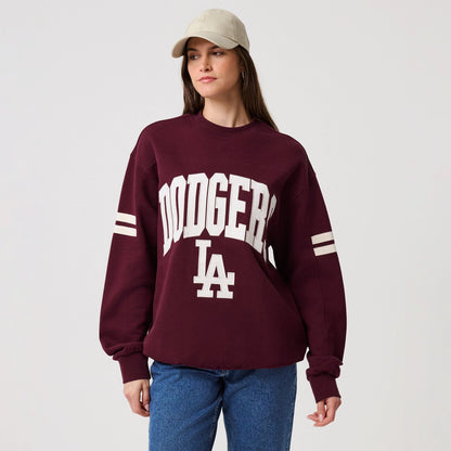 The model is wearing this MLB Arch Graphic LA Dodgers Crew Neck Sweater in dark purple. 4