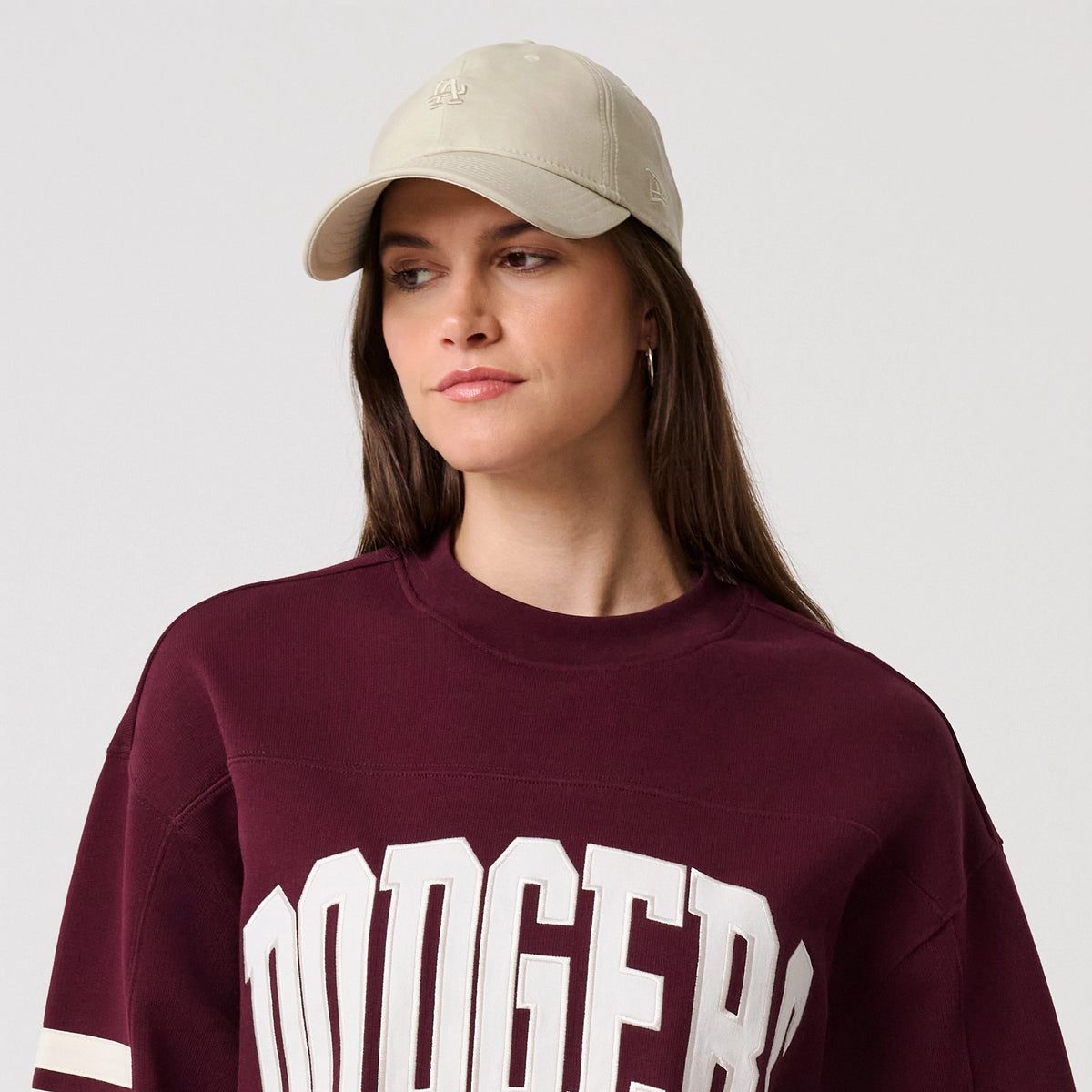 The model is wearing this MLB Arch Graphic LA Dodgers Crew Neck Sweater in dark purple. 6
