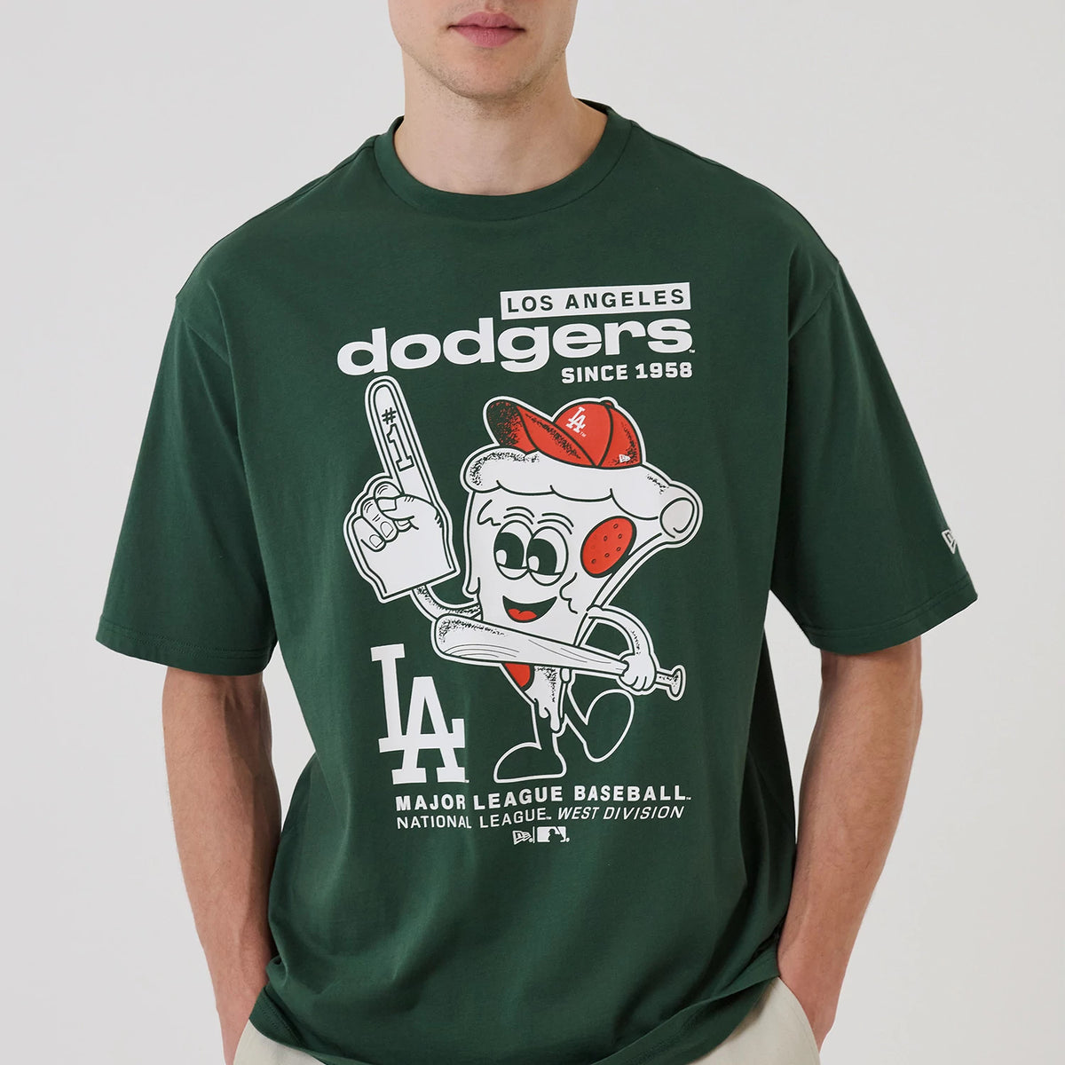 The model is wearing this MLB Food Graphic LA Dodgers Oversized T-Shirt in dark green. 3