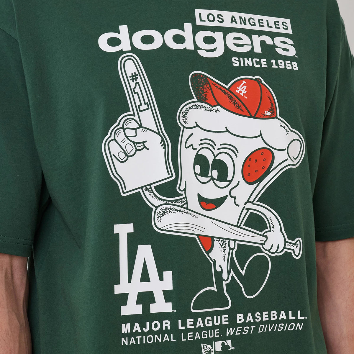 The model is wearing this MLB Food Graphic LA Dodgers Oversized T-Shirt in dark green. 4