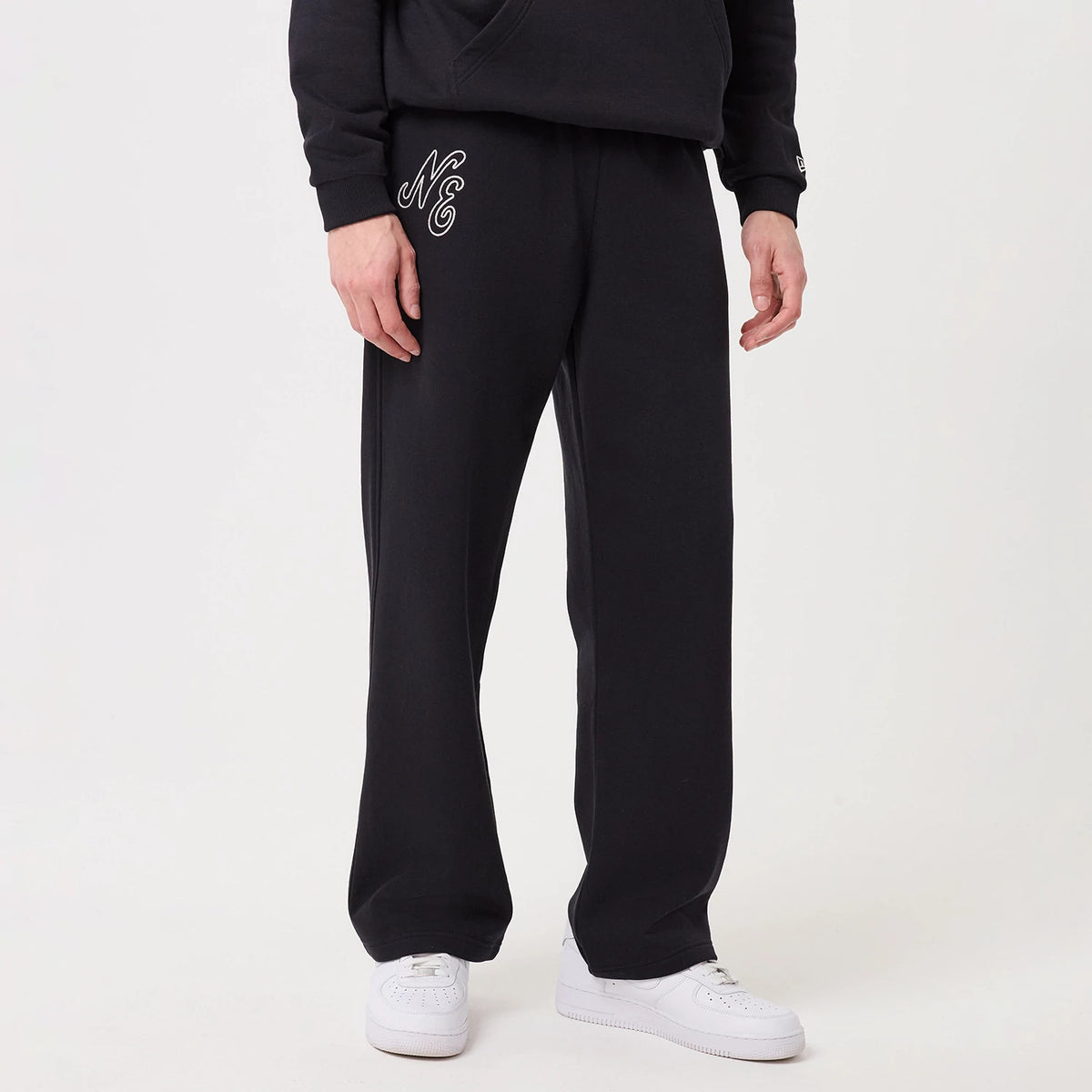 The model is wearing this New Era Straight Leg Joggers in navy. 1
