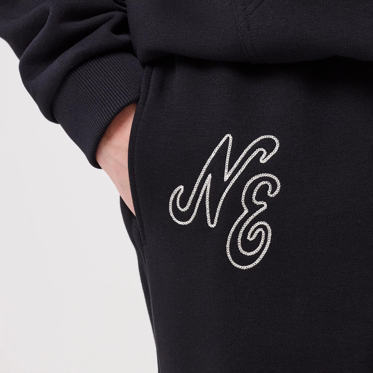 The model is wearing this New Era Straight Leg Joggers in navy. 3