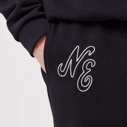 The model is wearing this New Era Straight Leg Joggers in navy. 3