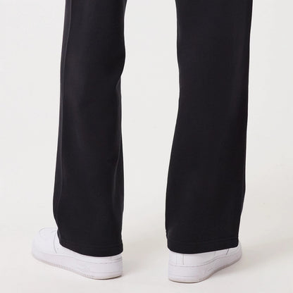 The model is wearing this New Era Straight Leg Joggers in navy. 7