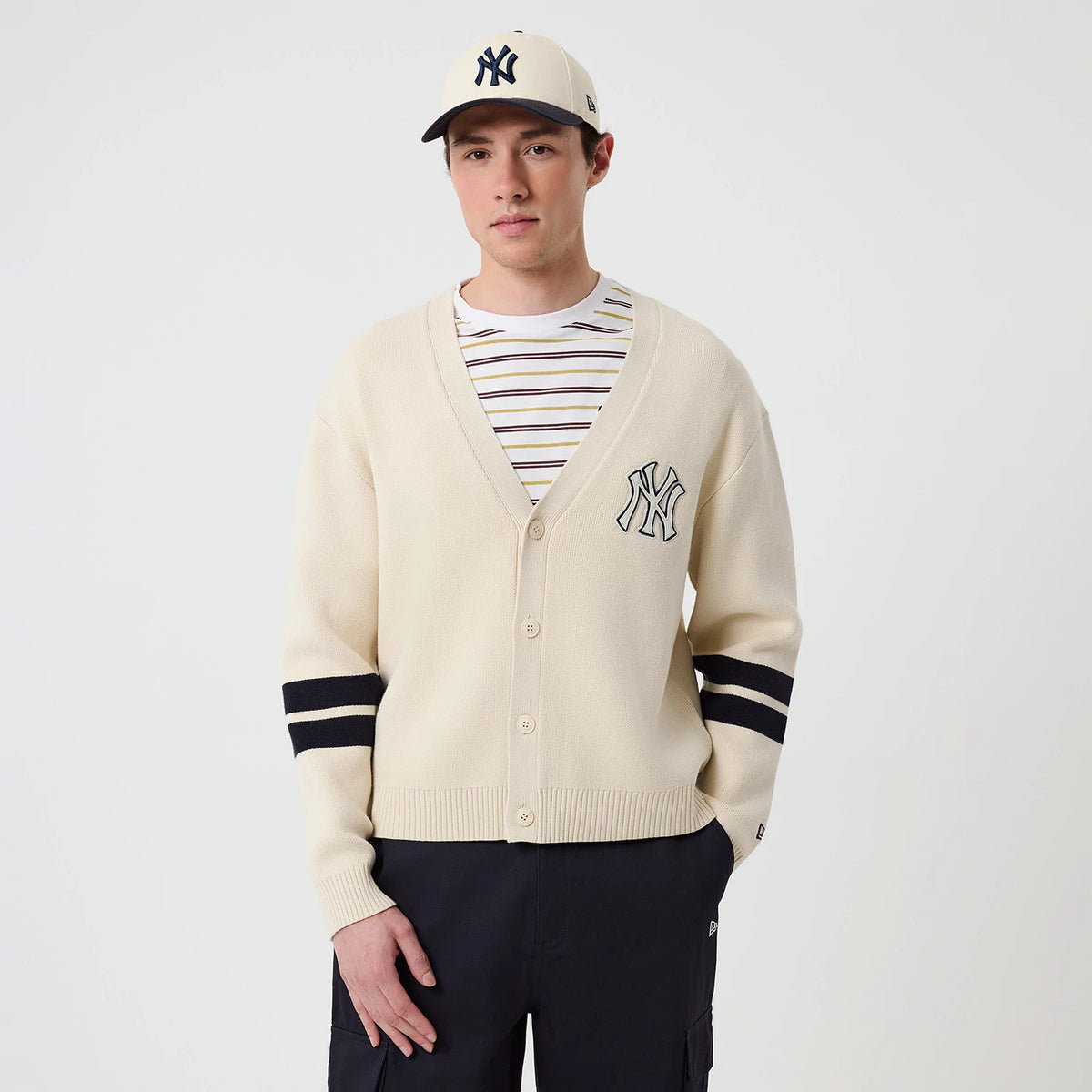 The model is wearing this MLB Knit New York Yankees Cardigan in light beige. 3