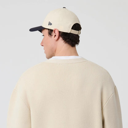 The model is wearing this MLB Knit New York Yankees Cardigan in light beige. 8
