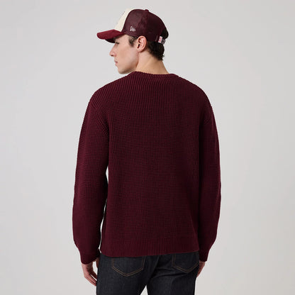 The model is wearing this MLB Waffle Knit New York Yankees Crew Neck Sweater in dark purple. 2