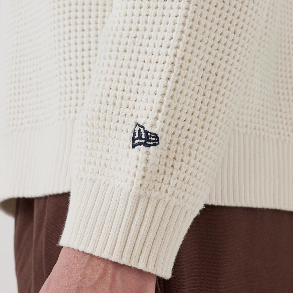 The model is wearing this MLB Waffle Knit LA Dodgers Crew Neck Sweater in open white. 5